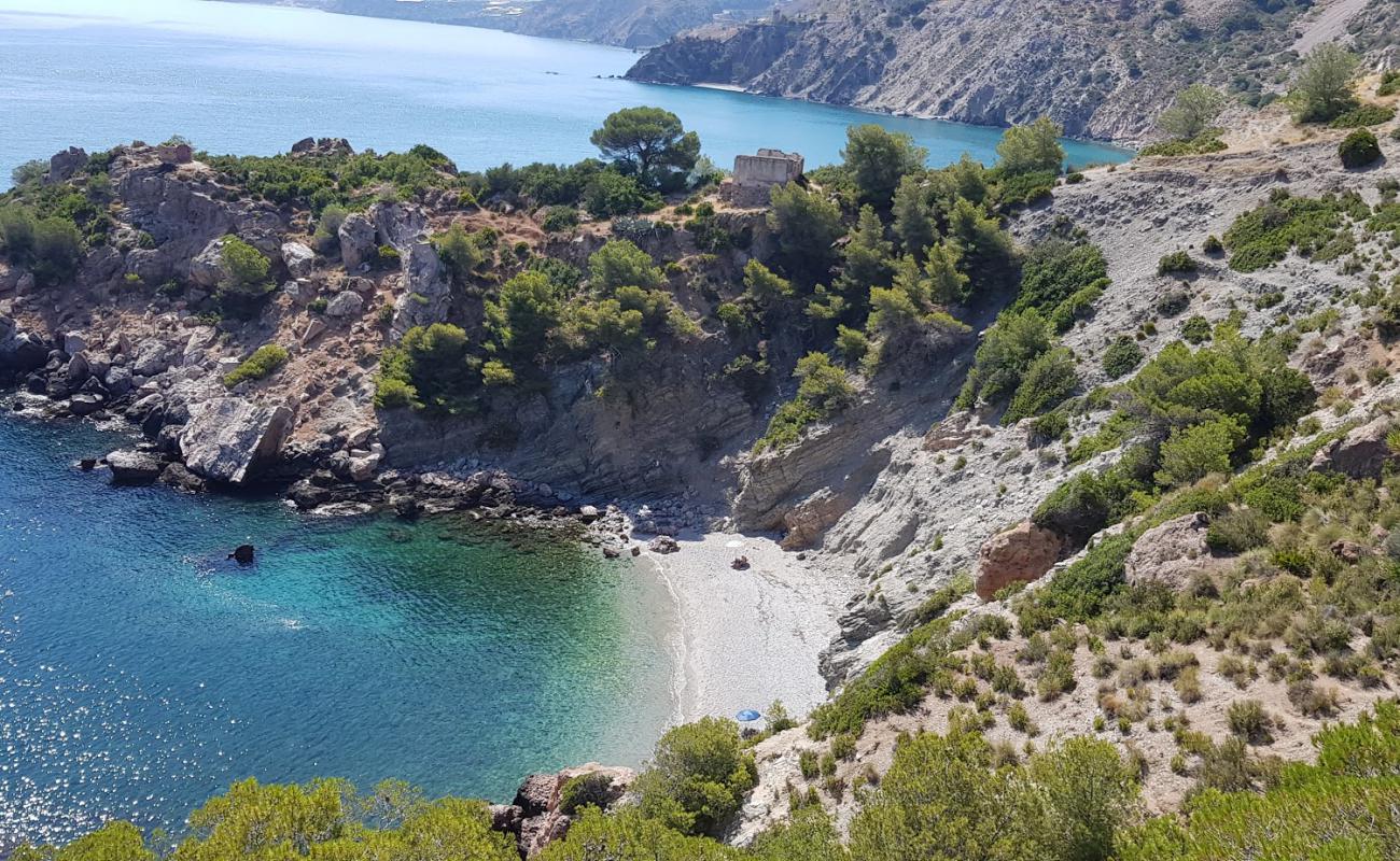 Photo de La Caleta beach avec caillou fin clair de surface