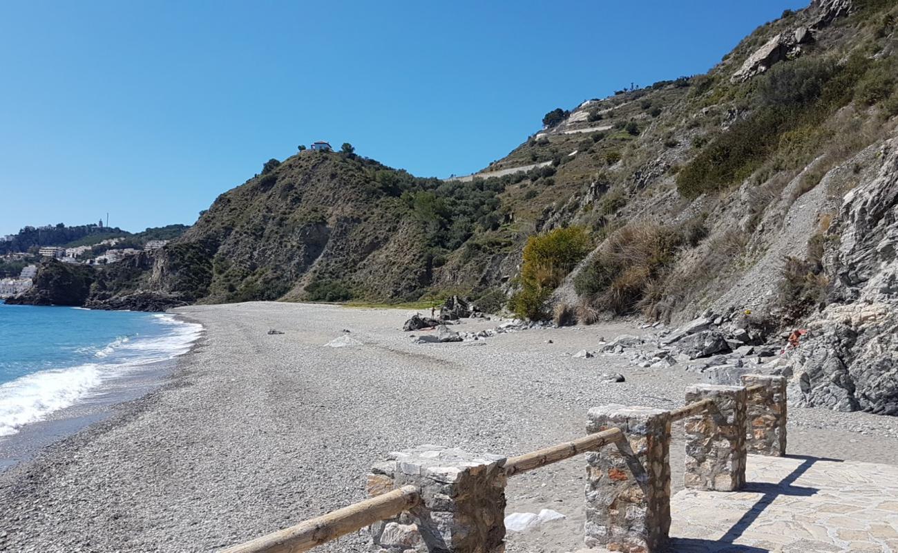 Photo de Playa el Muerto avec caillou fin gris de surface