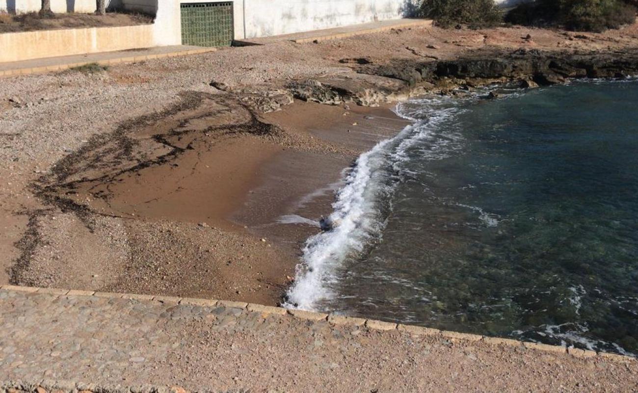 Photo de Cala Tobaco Beach avec sable gris & galets de surface