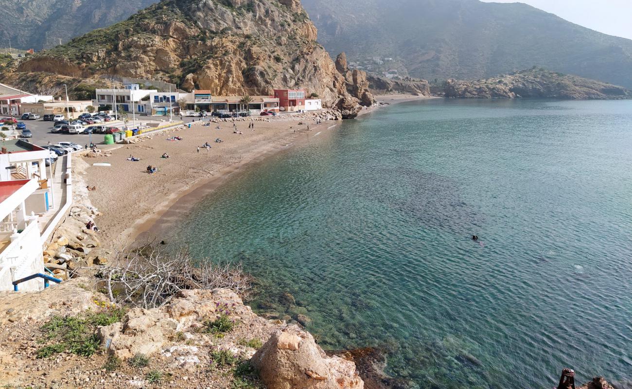 Photo de Playa El Portus avec sable noir & galets de surface