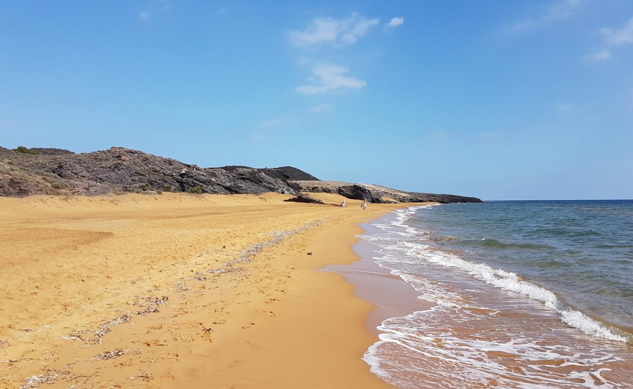 Photo de Playa Negrete avec sable brun de surface