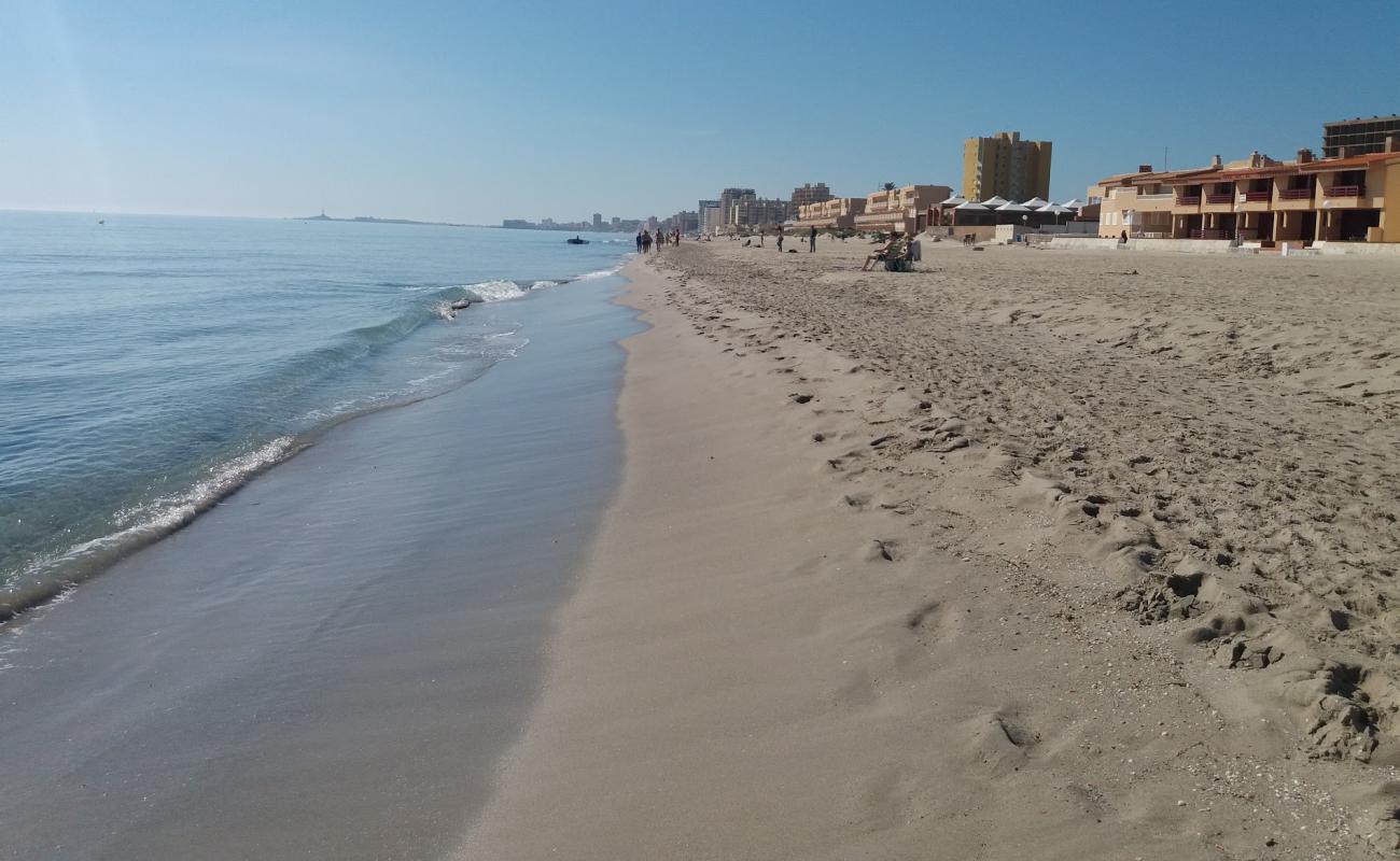 Photo de Playa El Arenal avec sable lumineux de surface