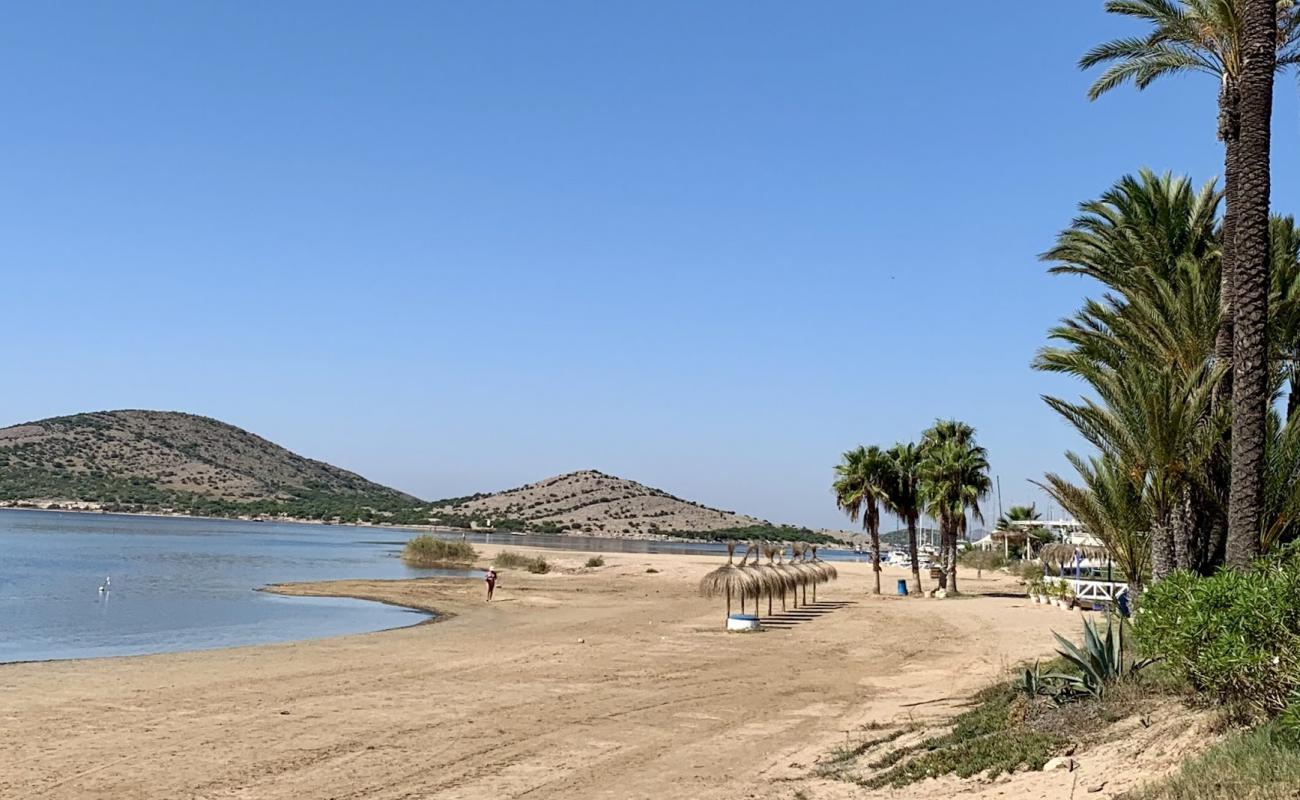 Photo de Playa de Puerto Bello avec sable brun de surface