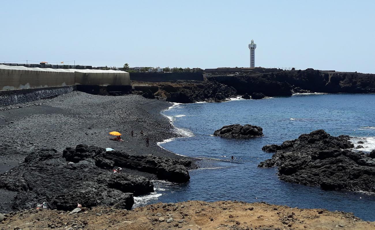 Photo de Playa Escondida avec sable blanc avec roches de surface