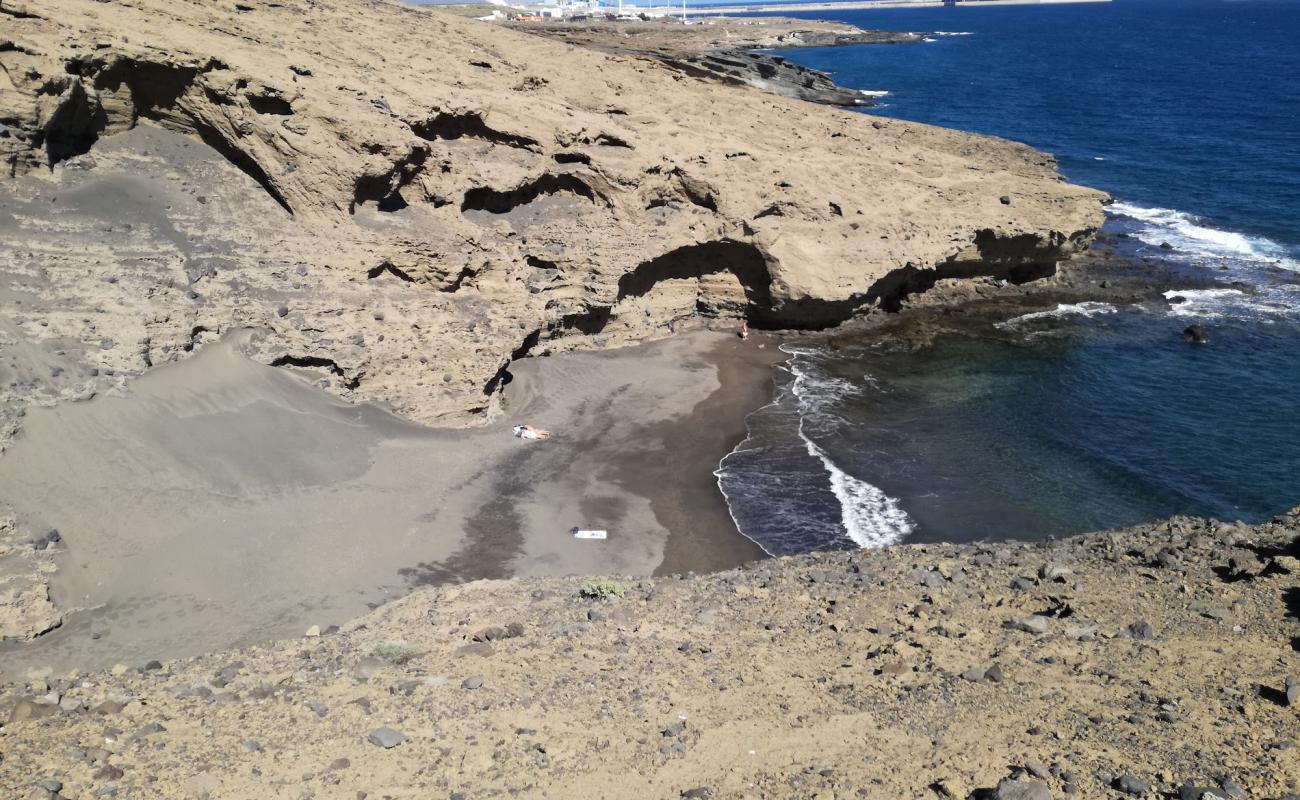 Photo de Playa la Rajita avec sable brun de surface