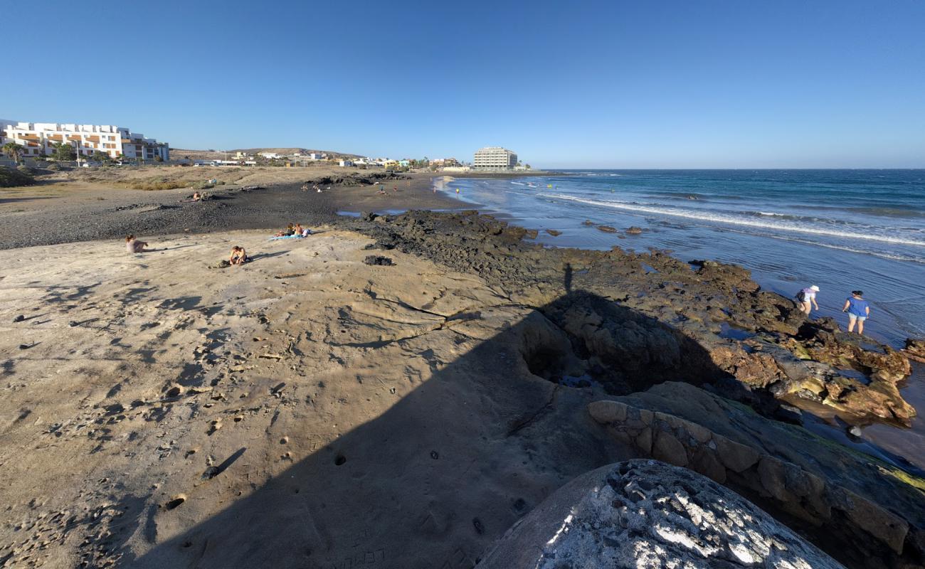 Photo de Playa El Salado avec sable gris de surface