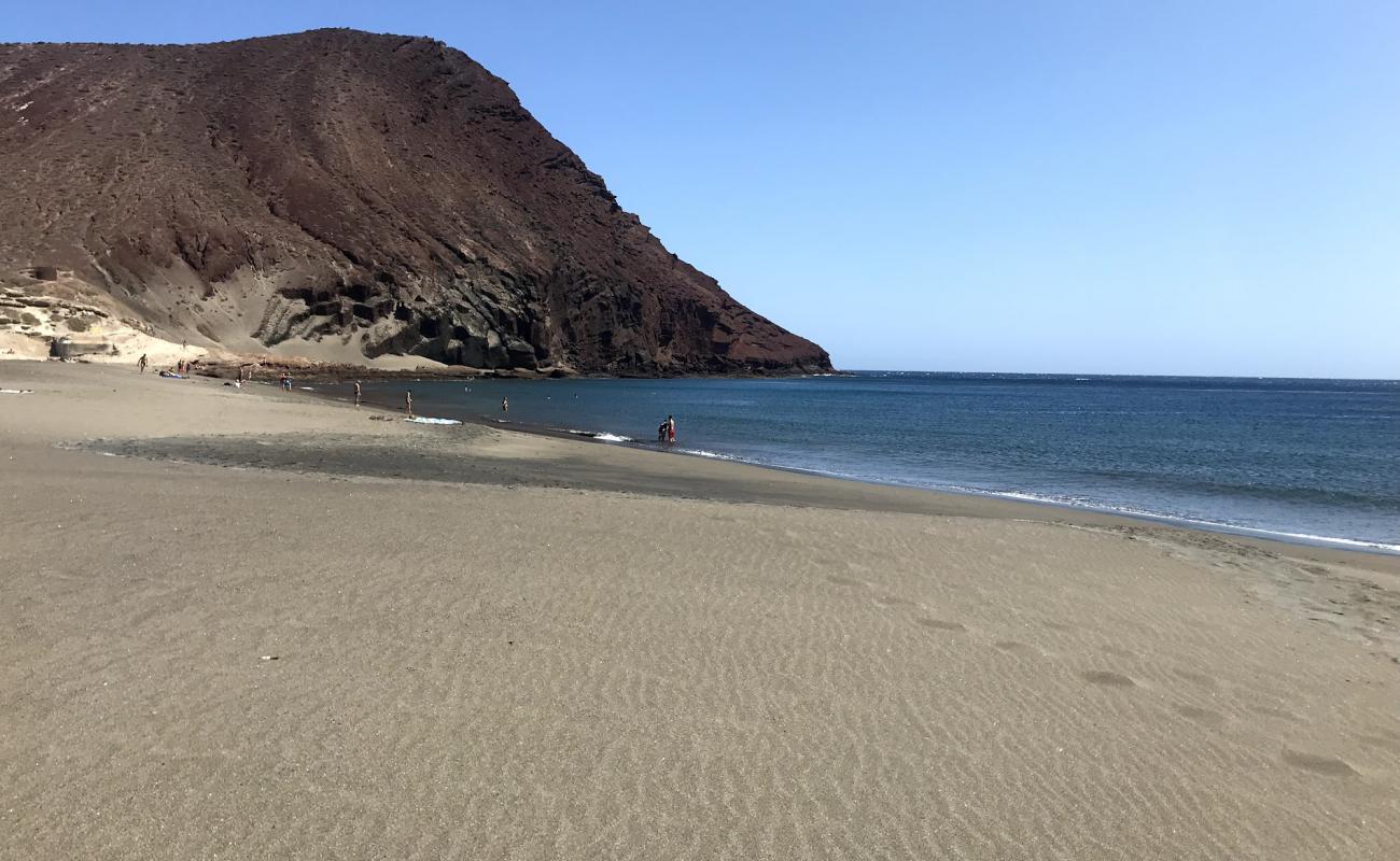 Photo de Playa de la Tejita avec sable brun de surface