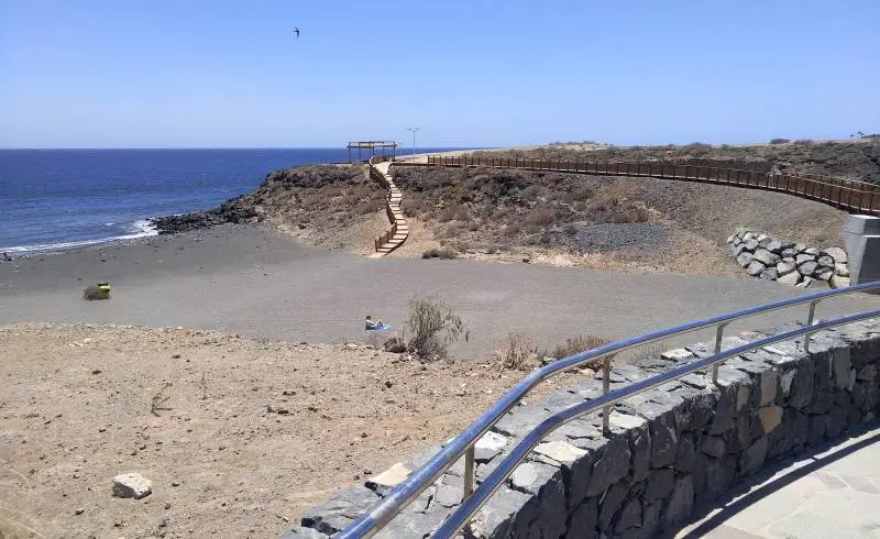 Photo de Playa Los Abrigos avec sable brun de surface