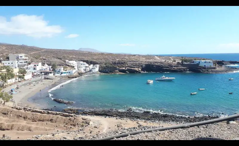 Photo de Playa Puertito avec sable fin et lumineux de surface