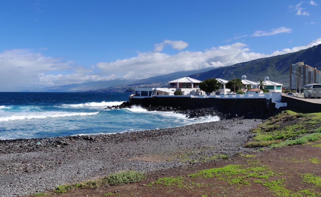 Photo de Playa del Puertito avec galets gris de surface