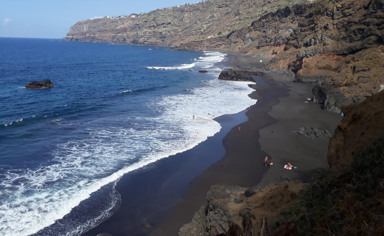 Photo de Playa Los Patos avec sable fin gris de surface