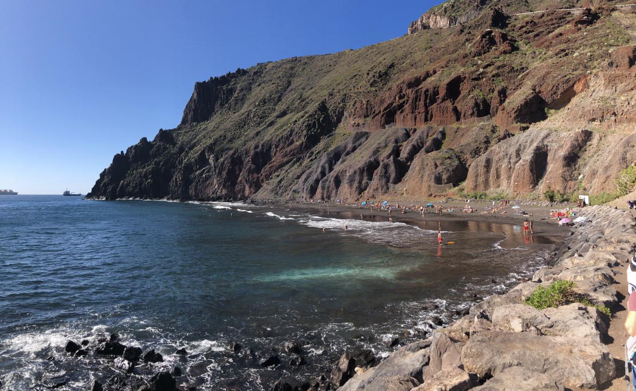 Photo de Playa de Las Gaviotas avec sable gris de surface