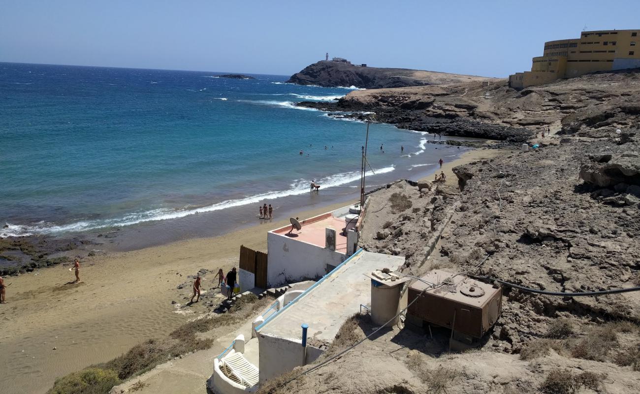 Photo de Playa del Cabron avec sable brun de surface