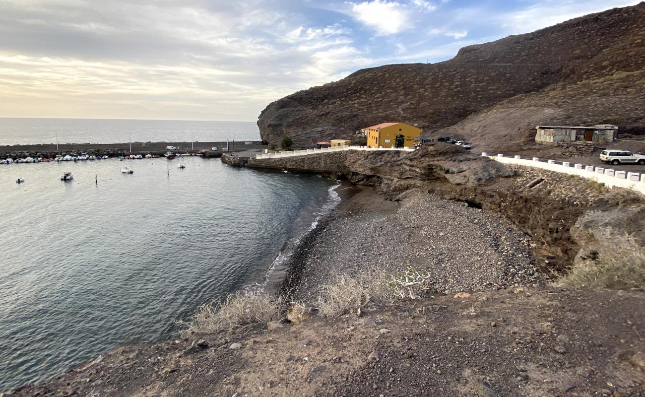 Photo de Playa de La Aldea II avec sable gris & rochers de surface
