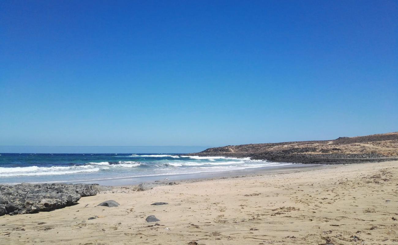 Photo de Playa Las Caletillas avec sable beige de surface