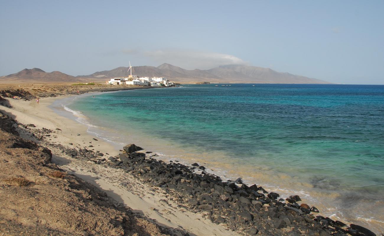 Photo de Playa "El Puertito" avec sable beige & pierres de surface