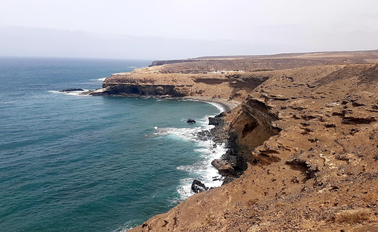 Photo de Playa de los Muertos avec galets gris de surface