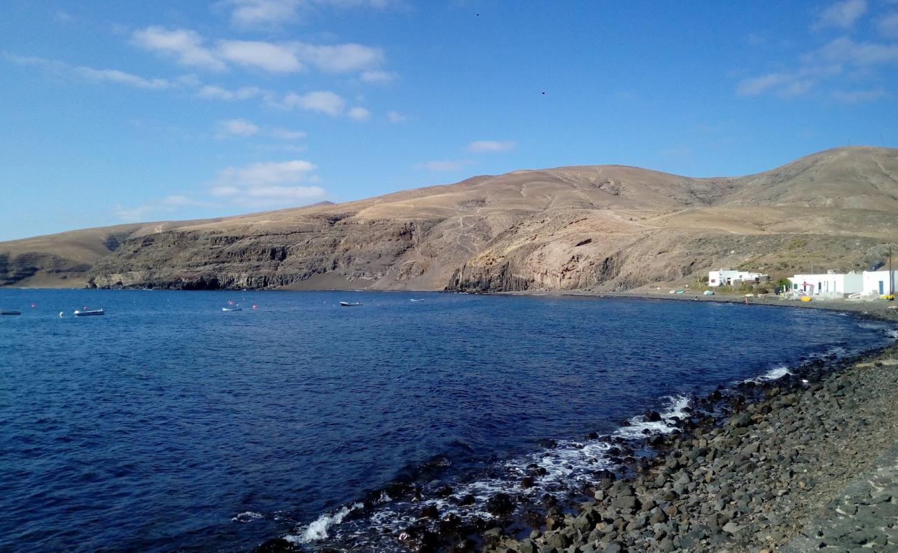 Photo de Playa Quemada avec terrain rocheux de surface