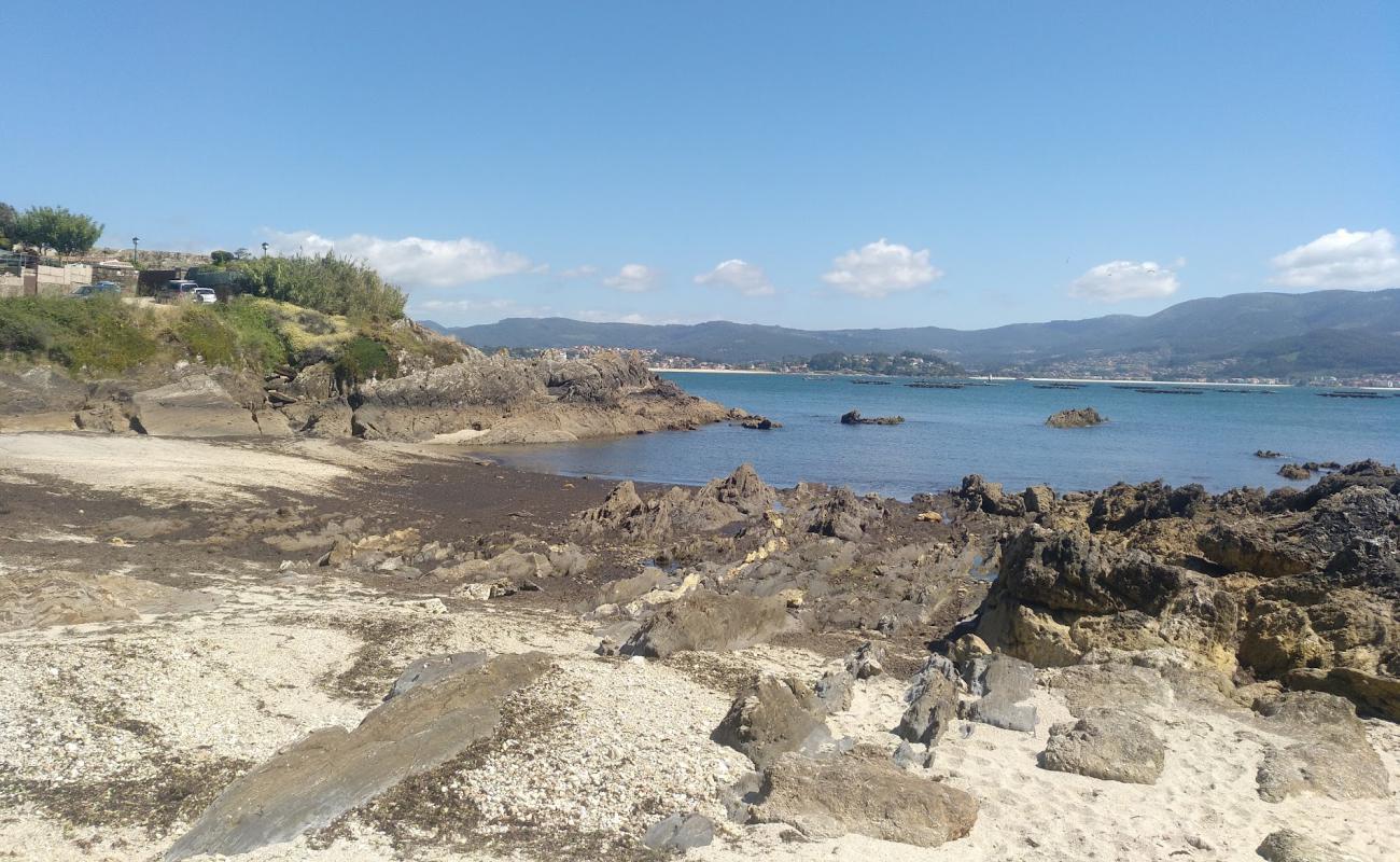 Photo de Praia de Portocelo avec sable blanc de surface