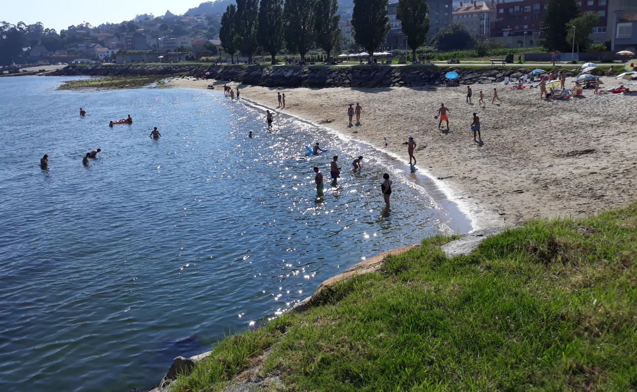 Photo de Praia da Tella avec sable blanc de surface