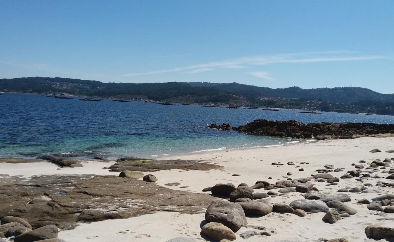 Photo de Praia de Lalada avec sable fin blanc de surface