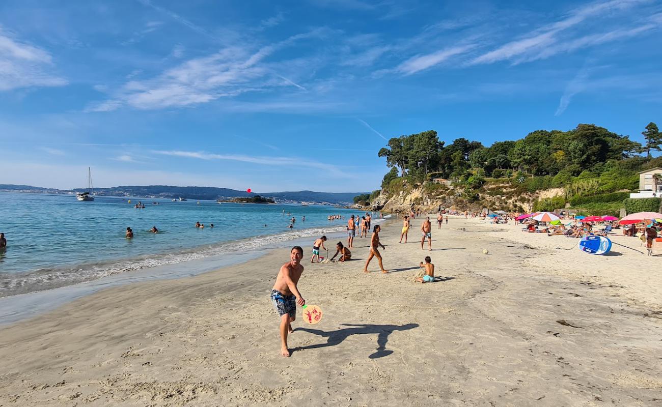 Photo de Praia de Lapaman avec sable fin blanc de surface