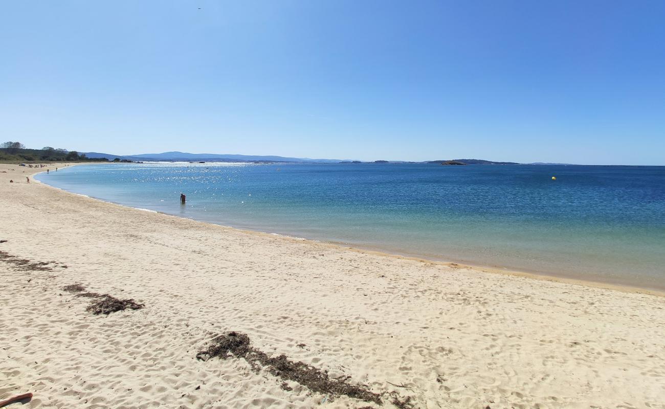 Photo de Carragueiros beach avec petits galets beige de surface