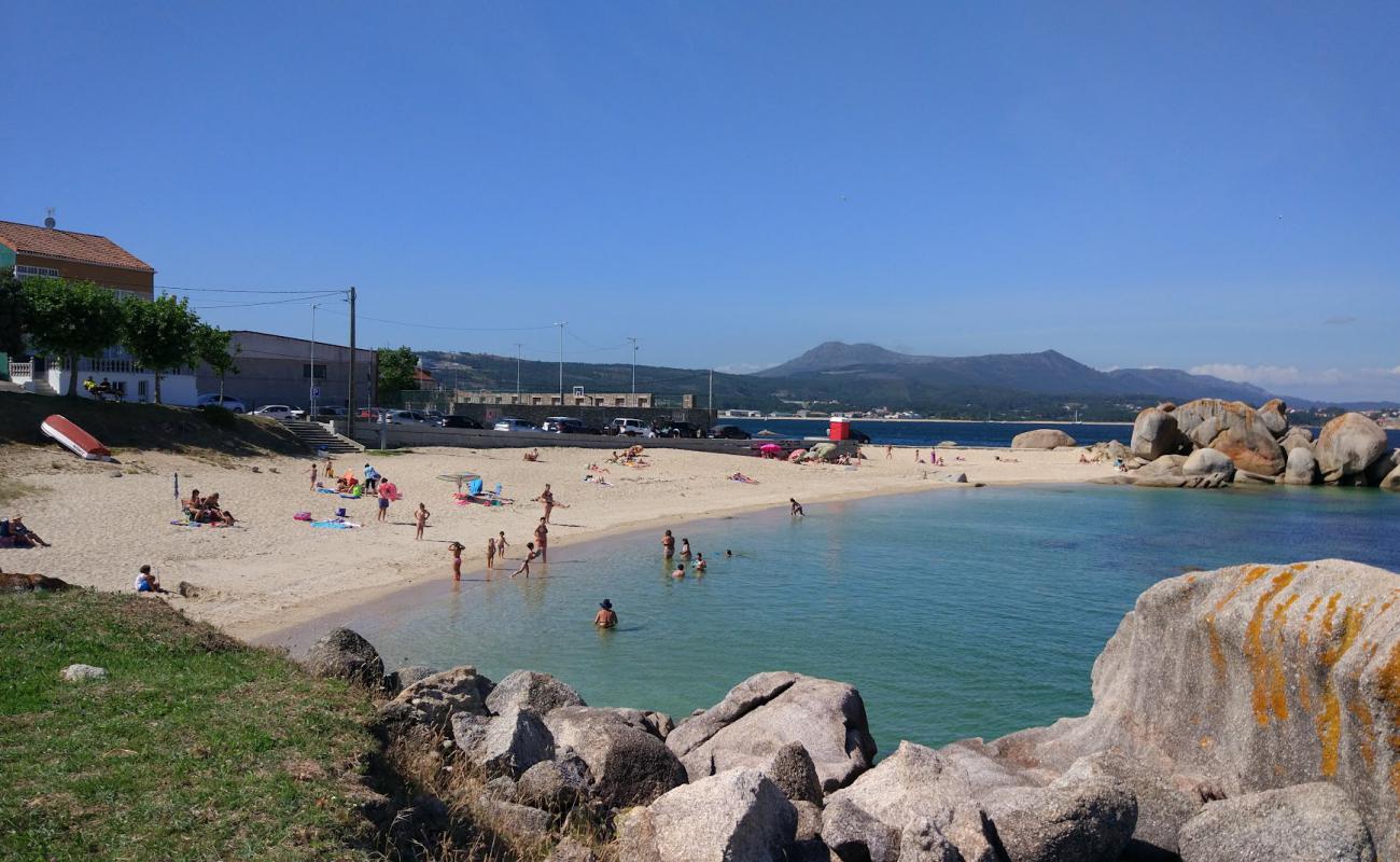 Photo de Secada beach avec sable lumineux de surface