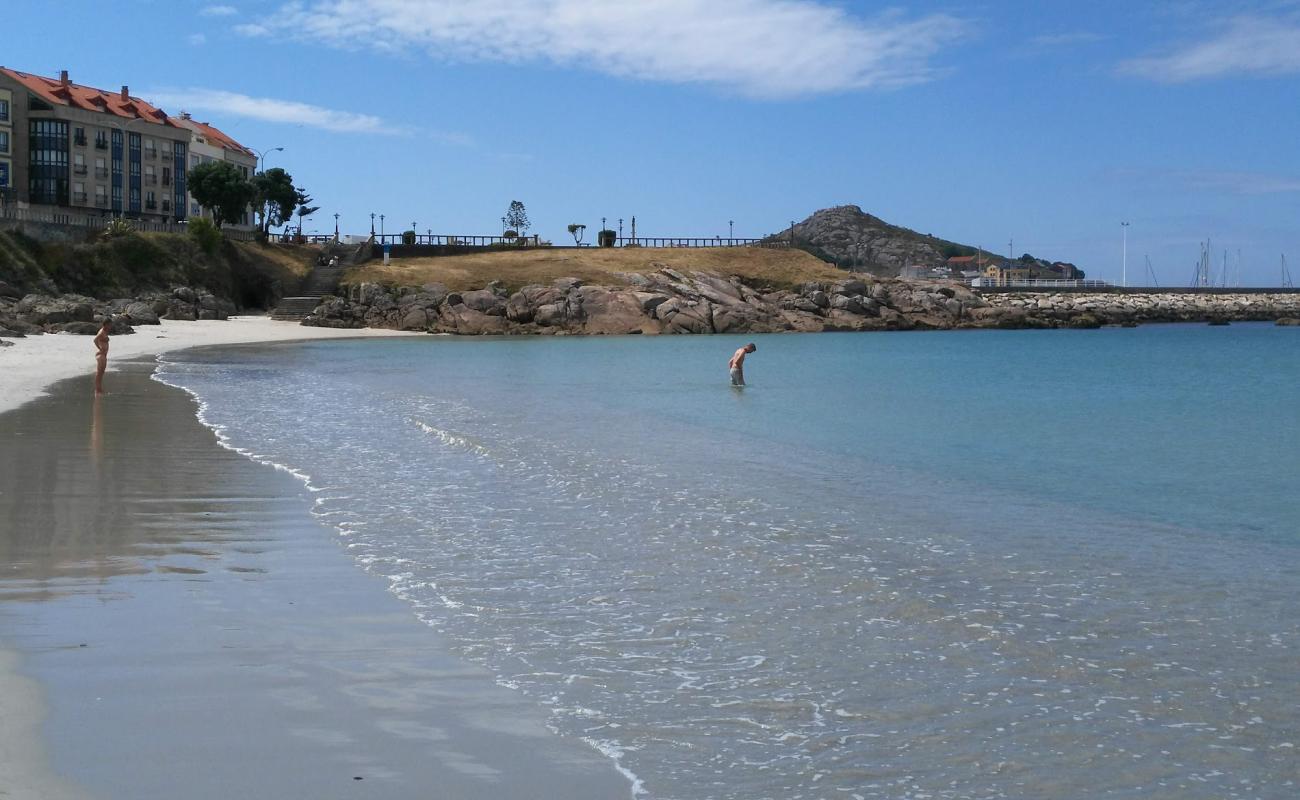 Photo de Praia Da Cruz avec sable blanc de surface