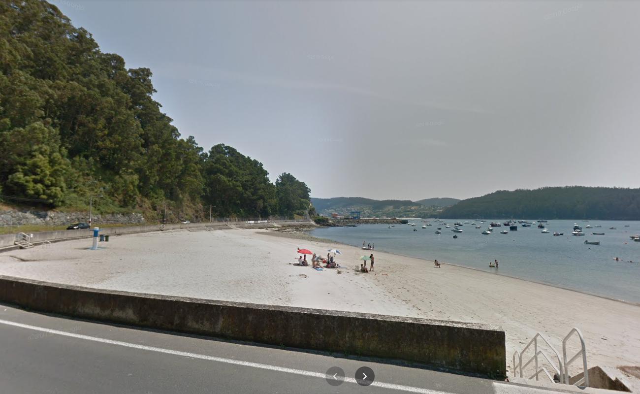 Photo de Praia de Area Longa avec l'eau cristalline de surface