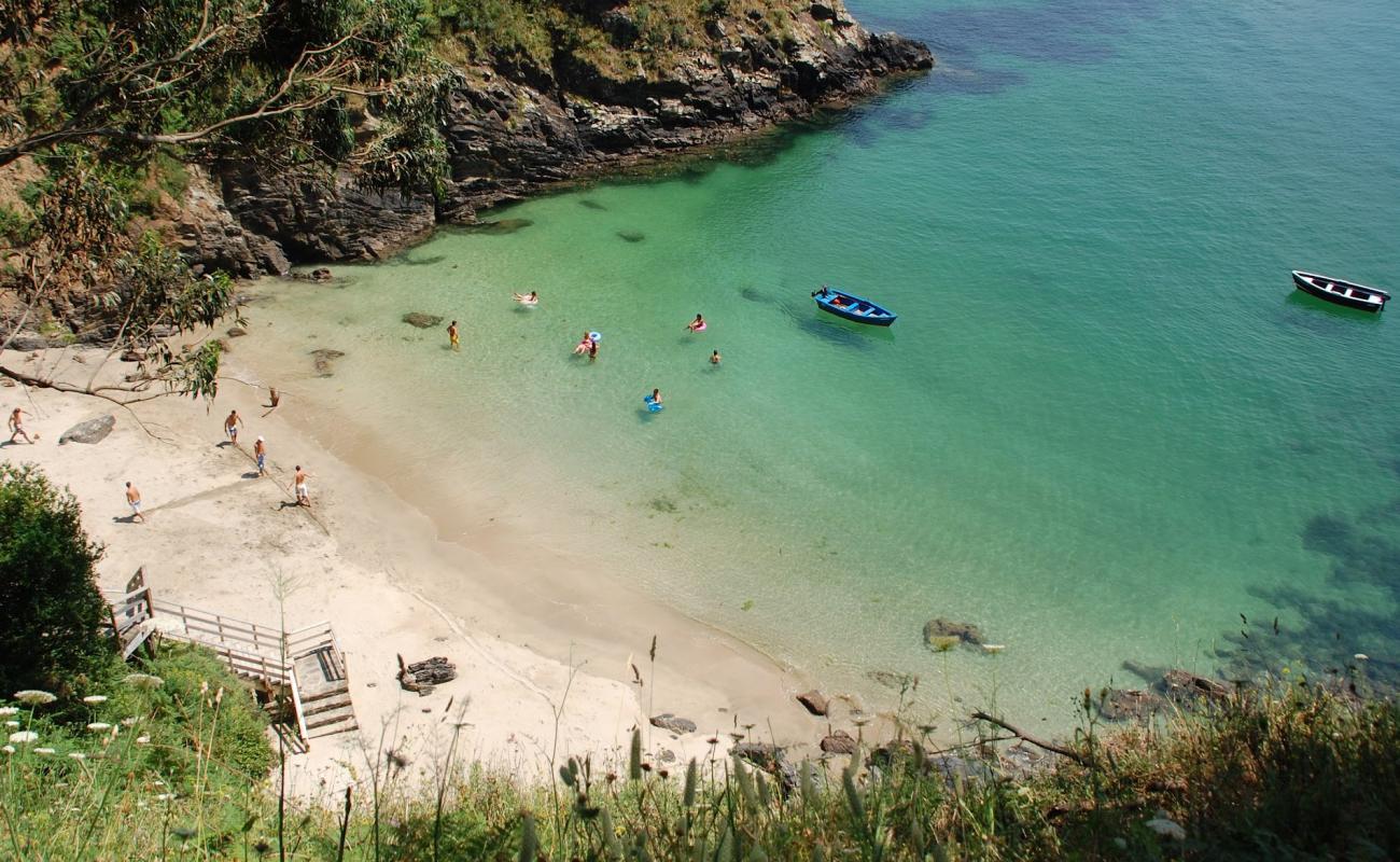 Photo de Cala Sonreiras avec sable blanc de surface