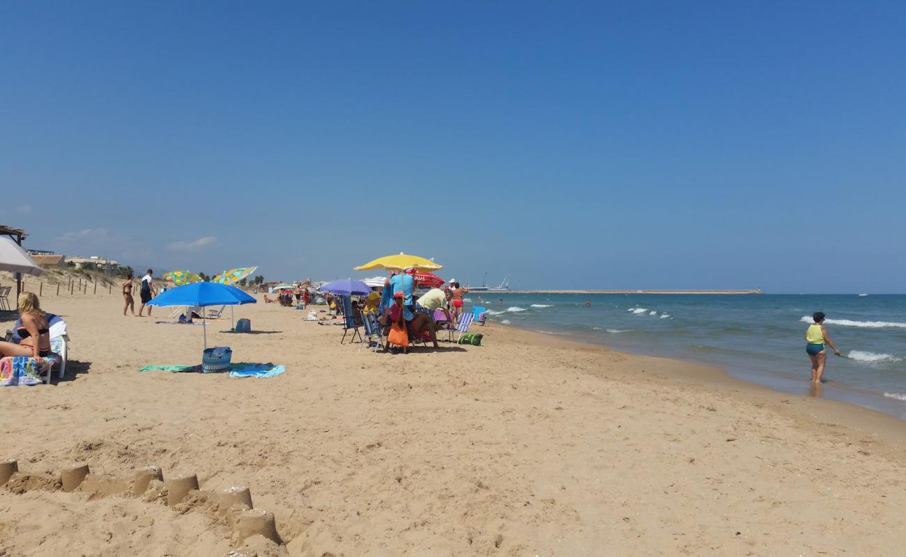 Photo de Plage de Daimus avec sable lumineux de surface