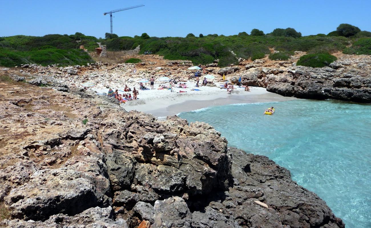 Photo de Cala Rafalino avec sable beige de surface