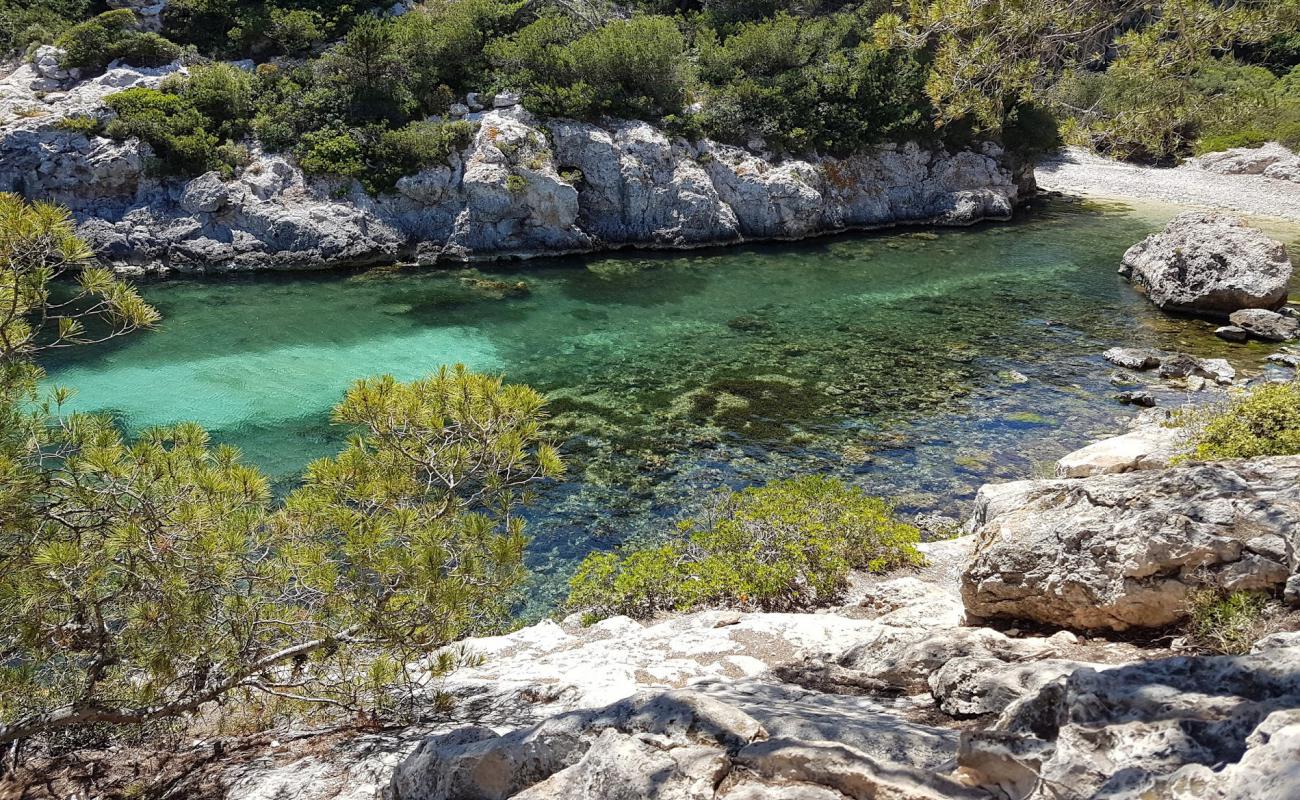 Photo de Platja de Cala Figuera avec caillou clair de surface