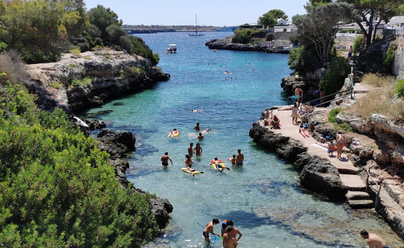 Photo de Platja de Sa Farola avec sable lumineux de surface