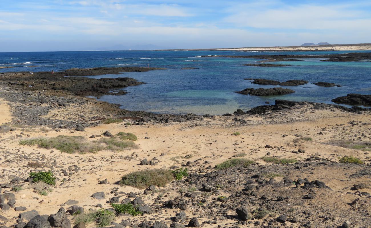 Photo de Playa El Rio avec sable beige de surface
