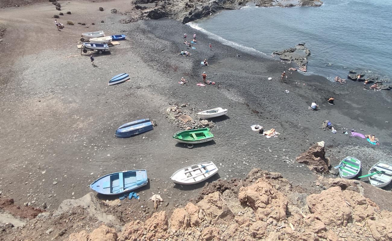 Photo de Playa El Complejo avec sable beige & pierres de surface