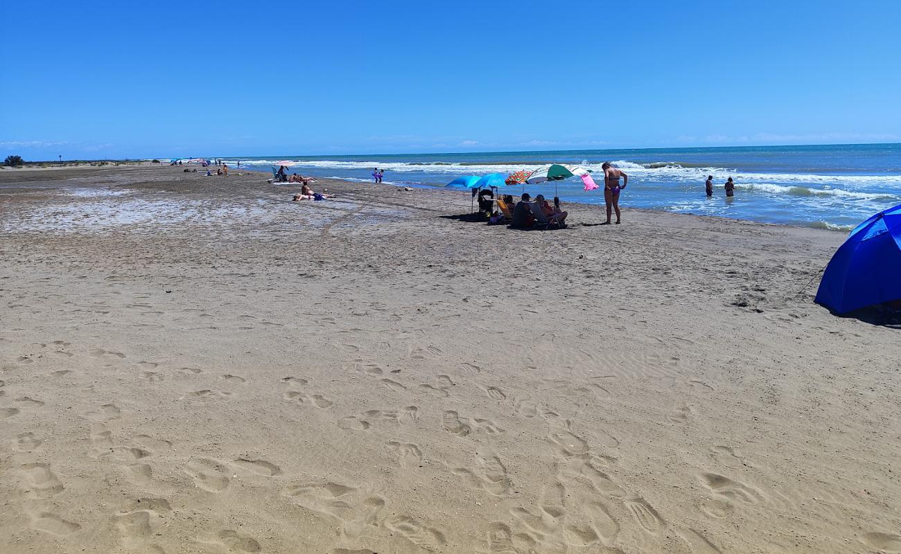 Photo de Platja de Migjorn avec sable beige de surface
