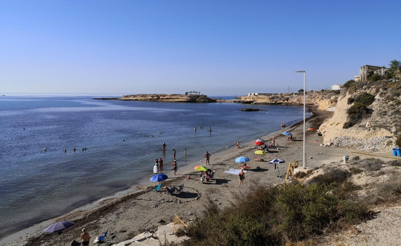 Photo de Platja de l'Almadrava avec sable lumineux de surface