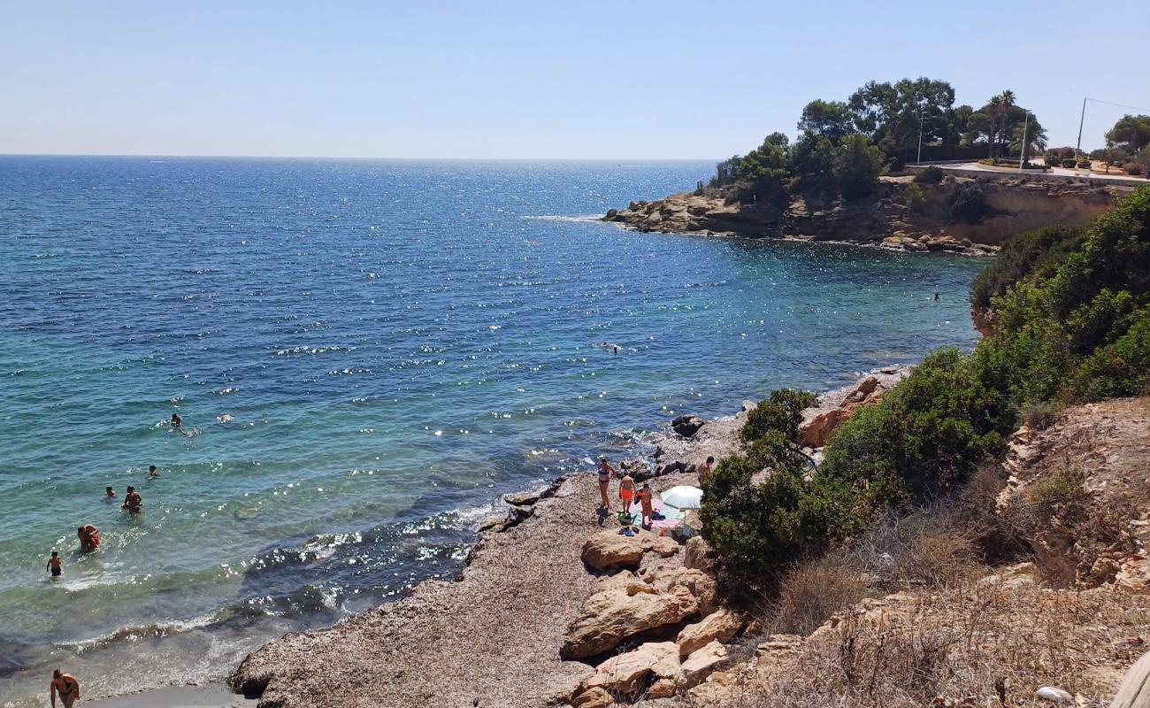 Photo de Cala La Calalga avec sable gris de surface