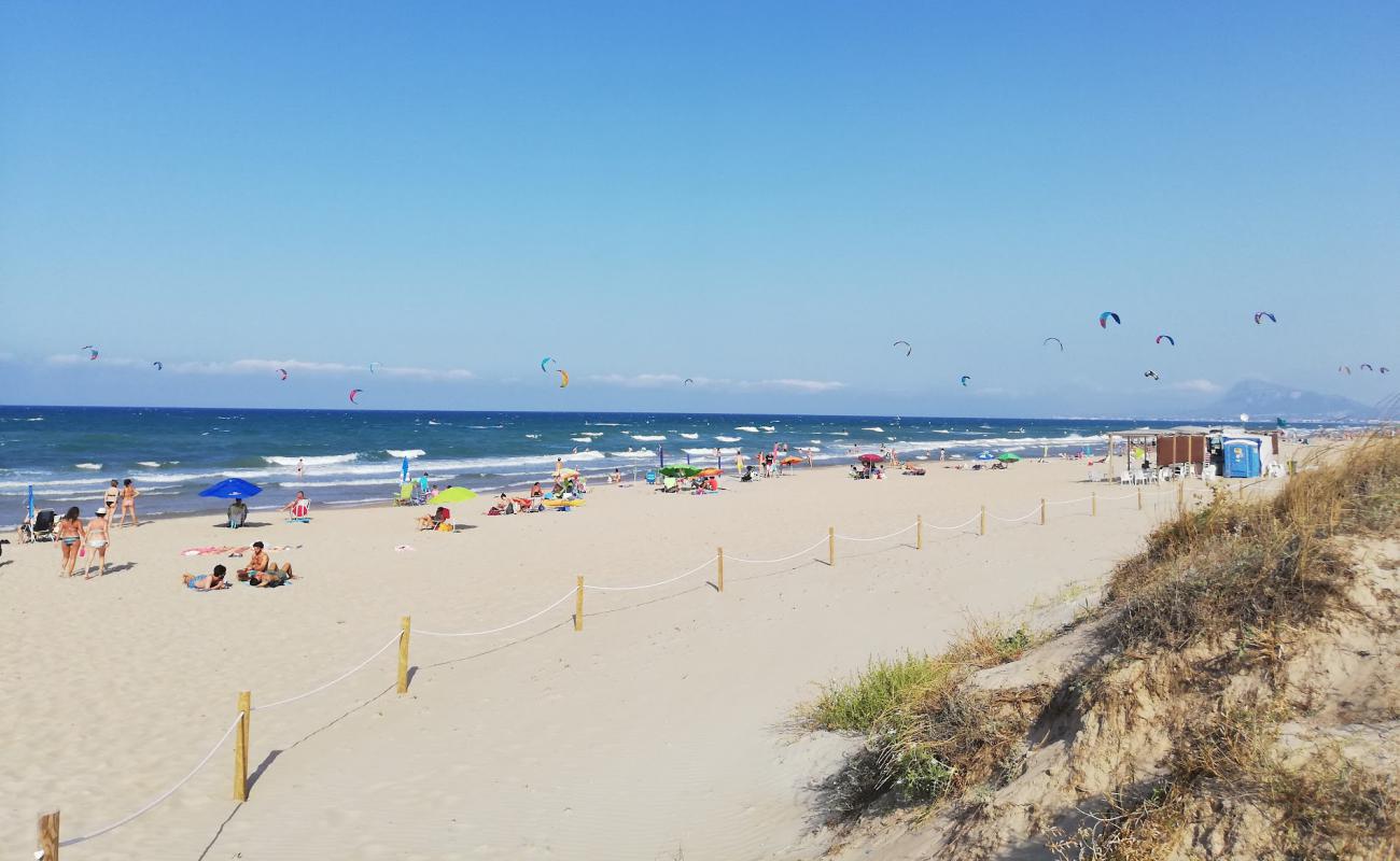 Photo de Platja de Rabdells avec sable lumineux de surface