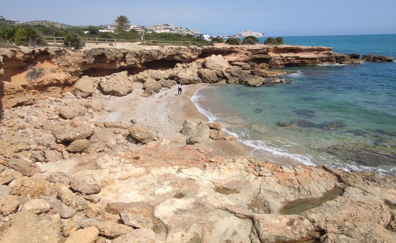 Photo de Cala Ordi avec sable brillant et rochers de surface