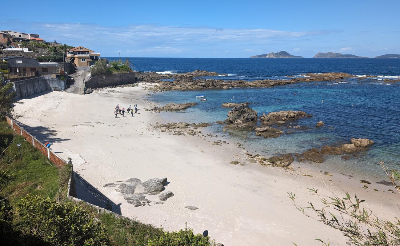 Photo de Praia do Portino avec sable lumineux de surface