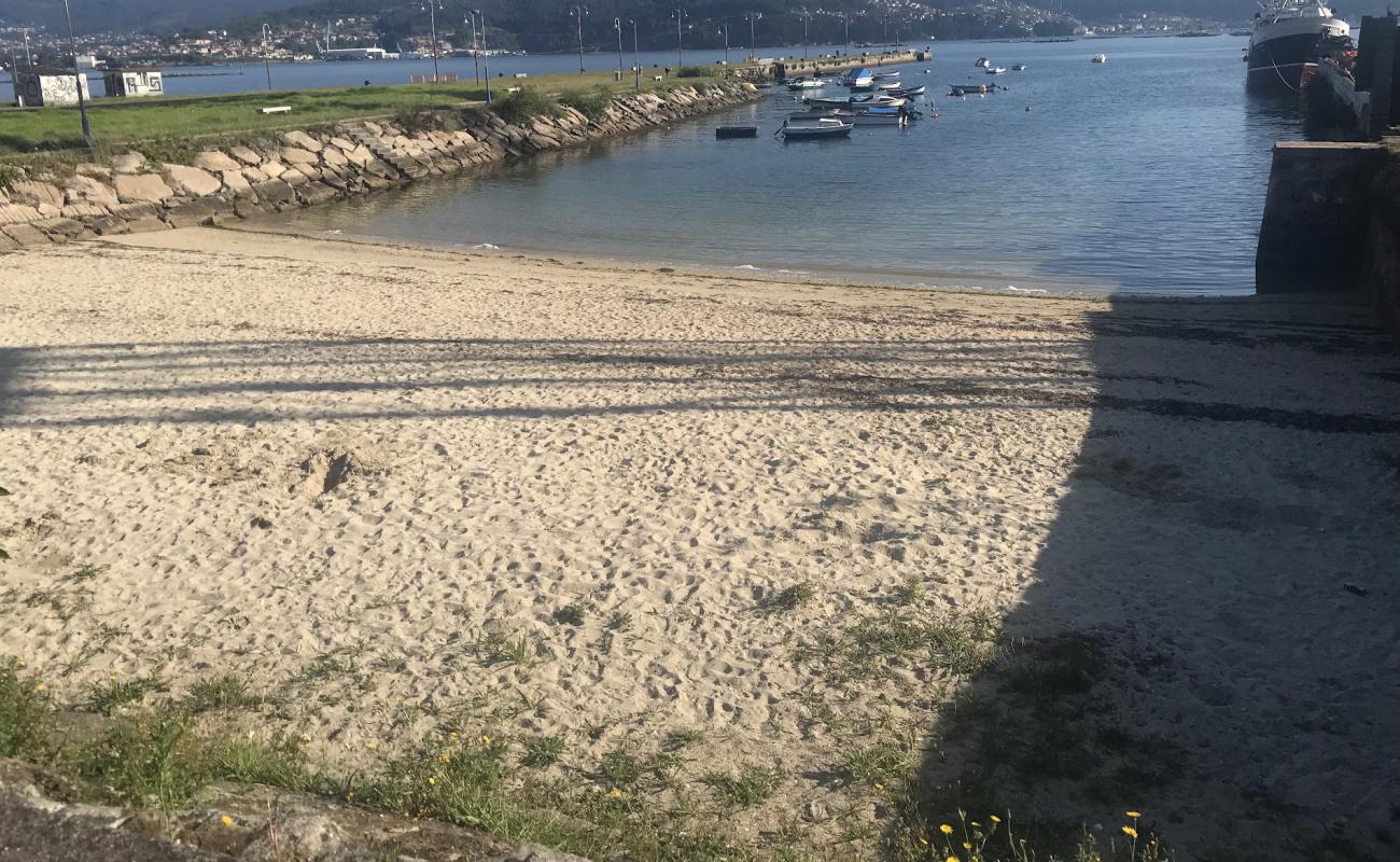 Photo de Praia de Rios de Dentro avec sable beige de surface