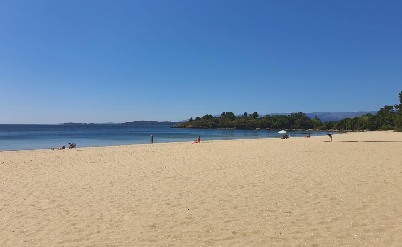 Photo de Beach das Cunchas avec sable beige de surface