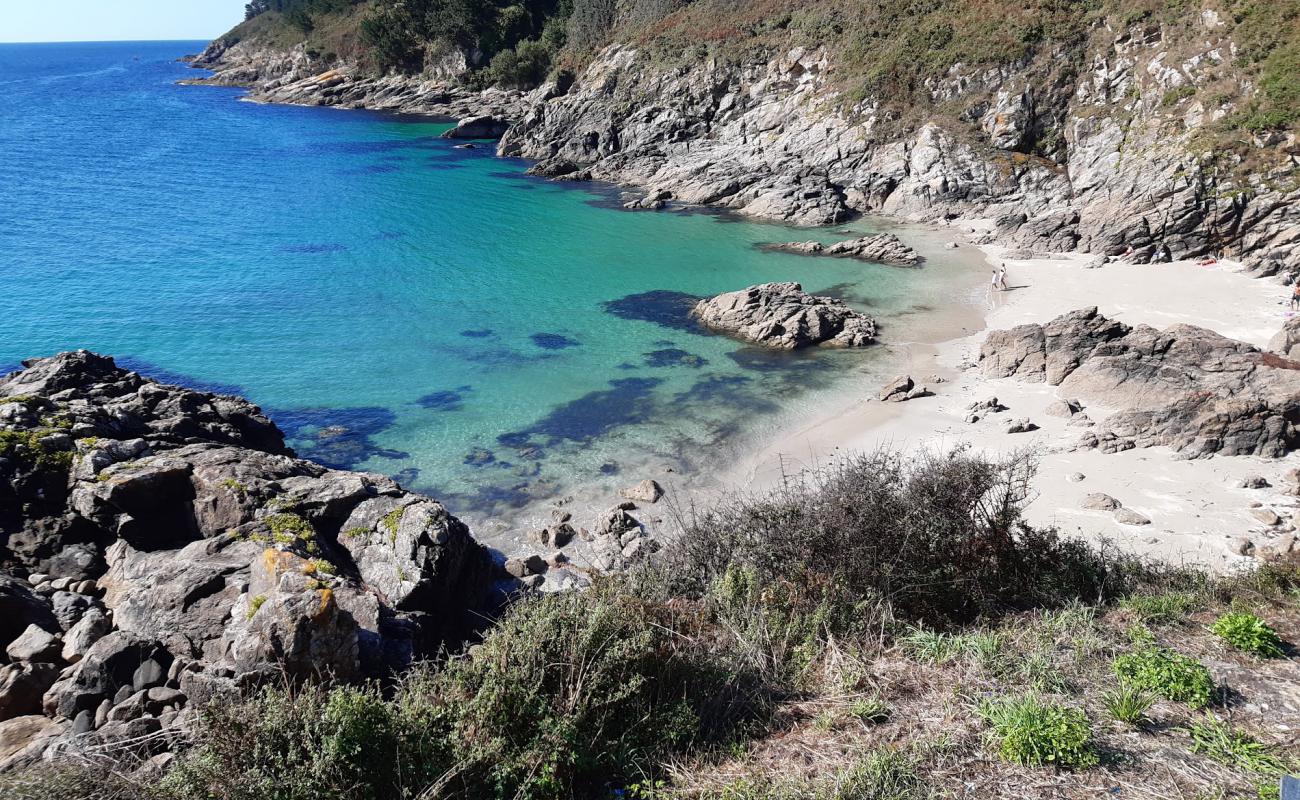 Photo de Praia Corveiro avec sable lumineux de surface