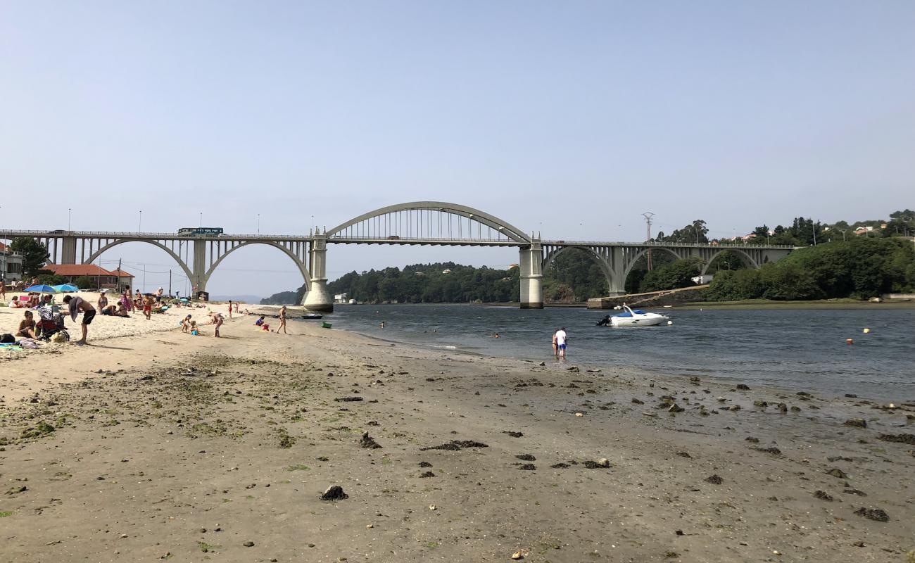 Photo de Praia do Pedrido avec sable beige de surface