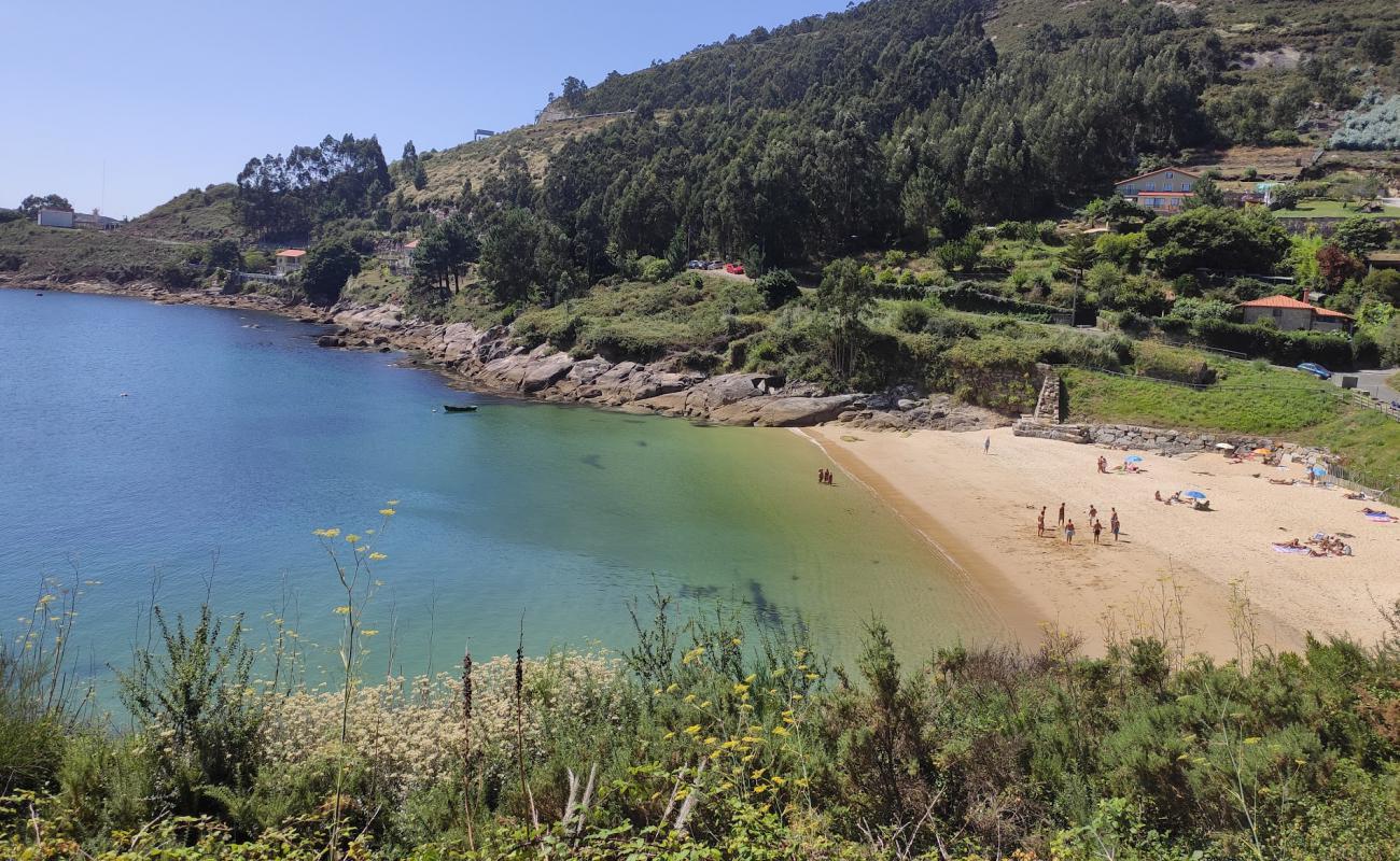 Photo de Praia de Carino avec sable beige de surface