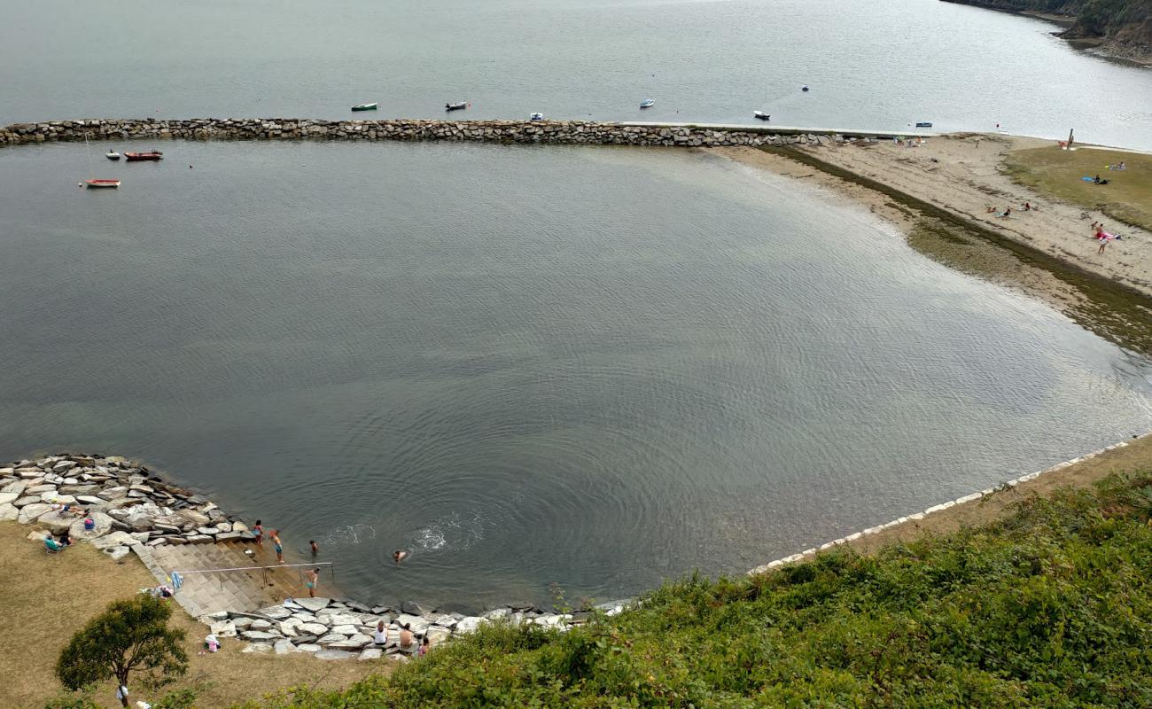 Photo de Praia dos Bloques avec sable beige de surface
