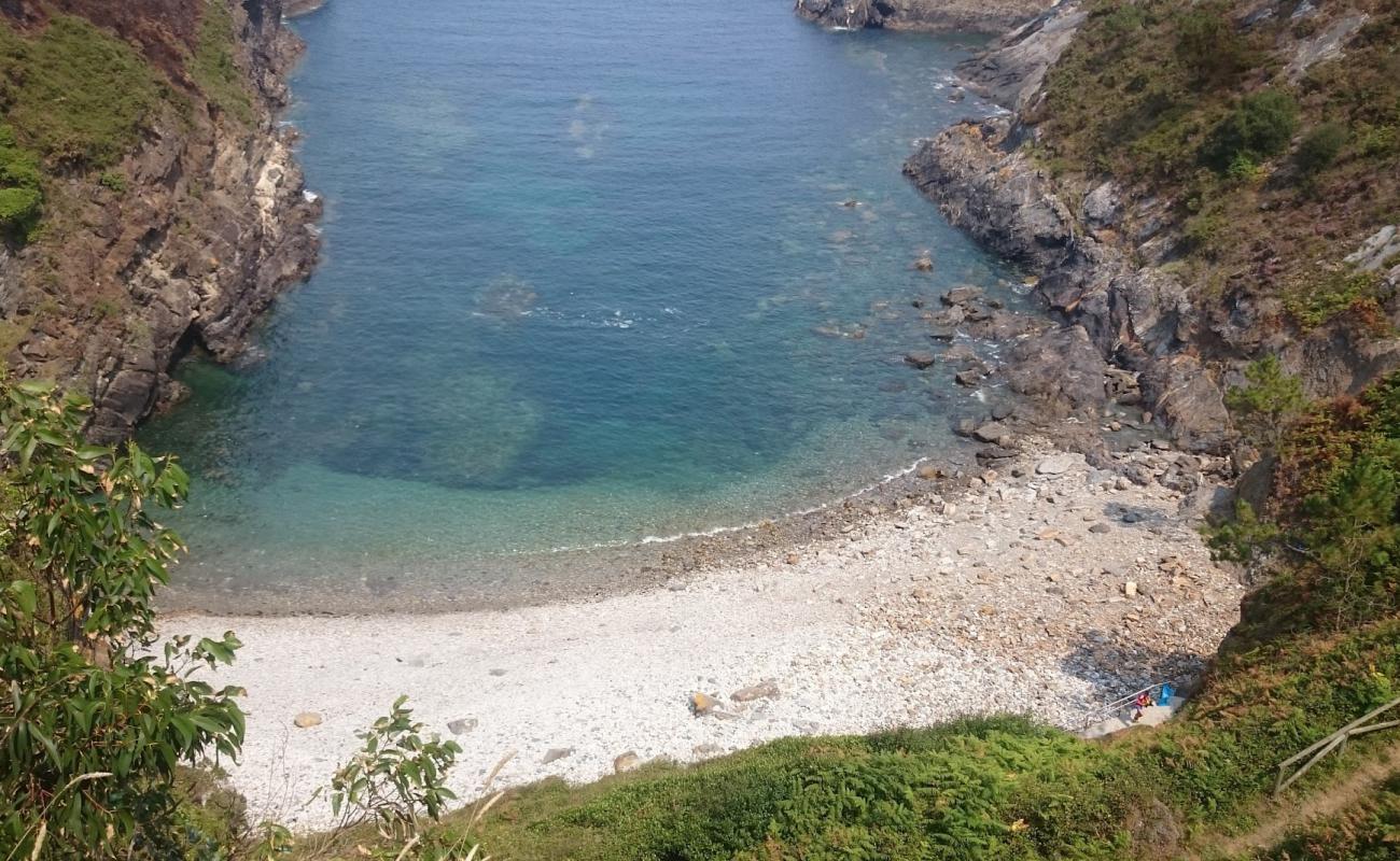 Photo de Playa de Monellos avec terrain rocheux de surface
